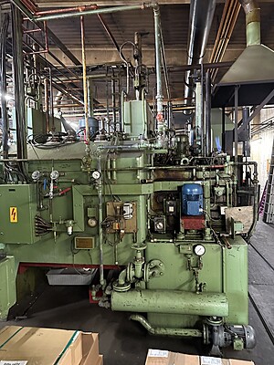 Complete hardening shop consisting of several ovens, protective gas generator, cleaning system Complete hardening shop consisting of several ovens, protective gas generator, cleaning system